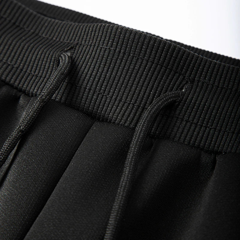 Graphic Print Thermal Plush Jogger Pants for Men Winter Sherpa Fleece Lined Sweatpants with Zipper Pockets Casual Cozy Trousers